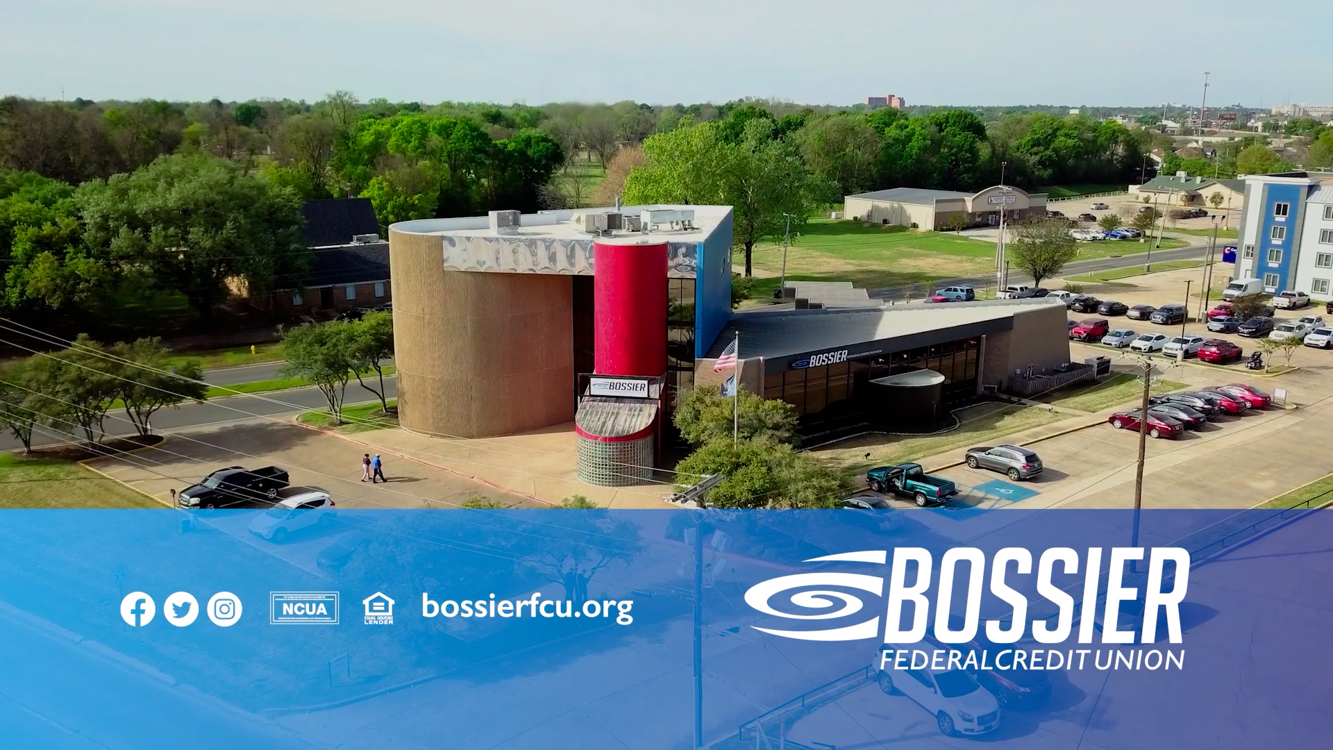 Aerial drone shot of the Bossier Federal Credit Union branch with the branded end card and logo overlay.